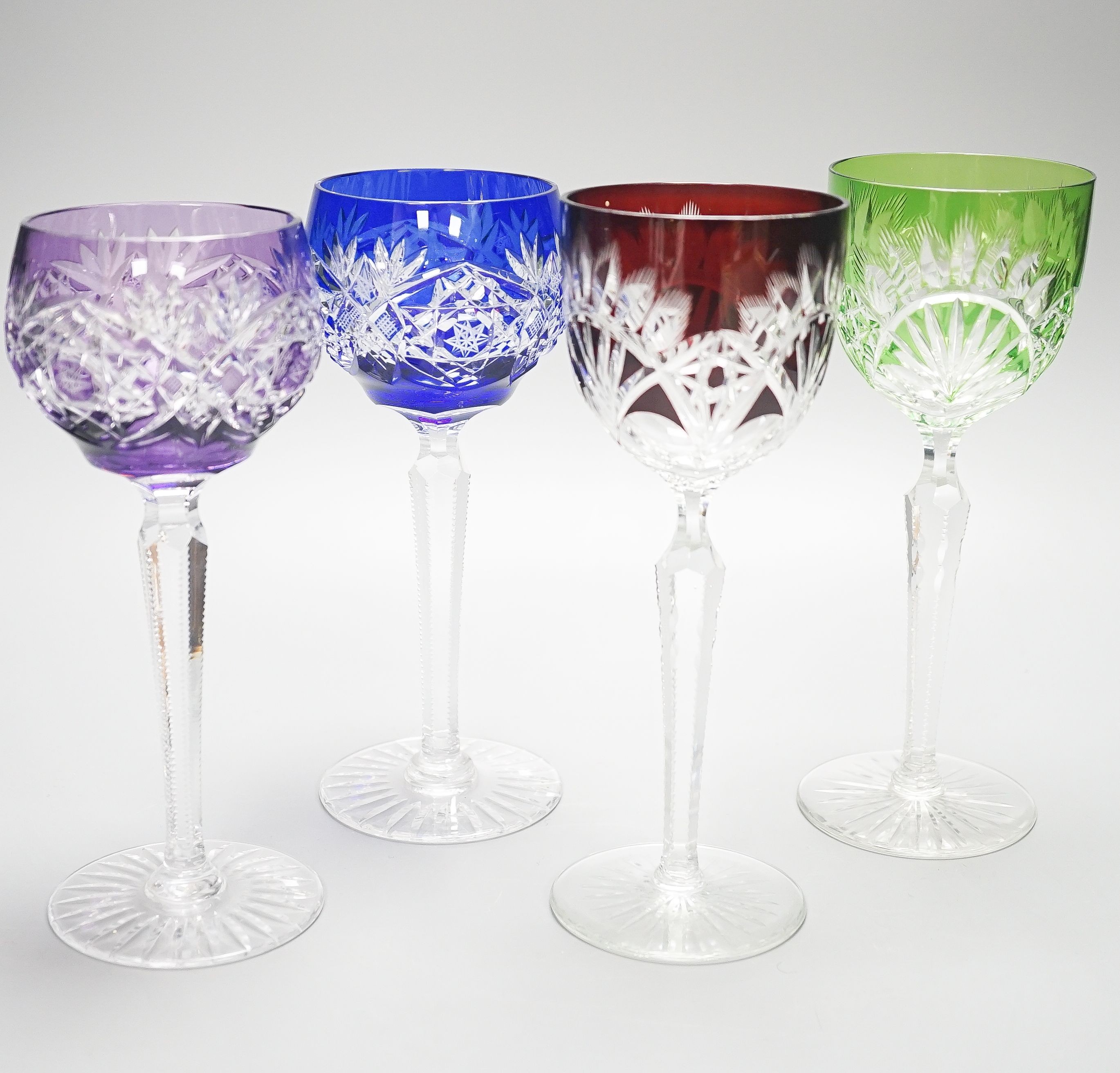 Two harlequin sets of six cut and colour flashed Hock glasses, tallest 21 cm(12)